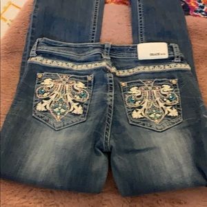 Gently used grace in la bootcut jeans